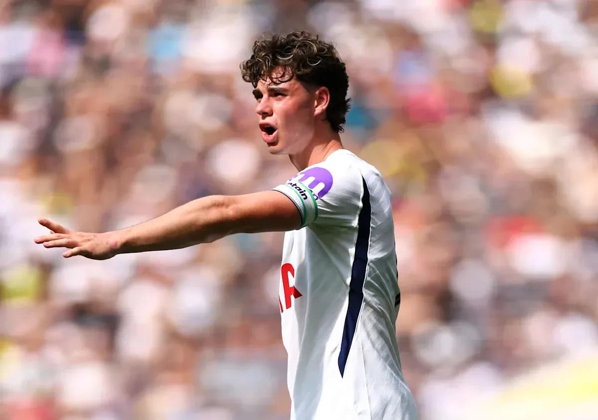 Player gesturing during a football match Player gesturing during a football match