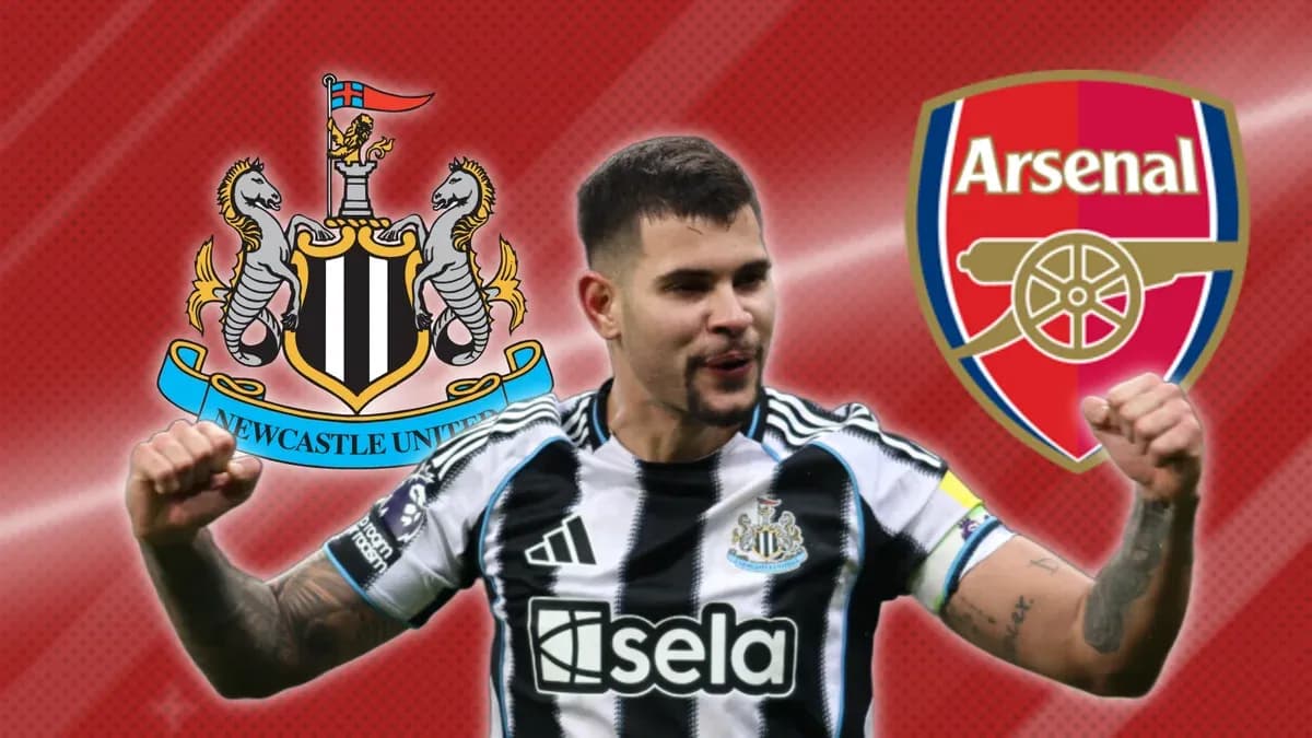Newcastle player celebrating with team logos in background Newcastle player celebrating with team logos in background