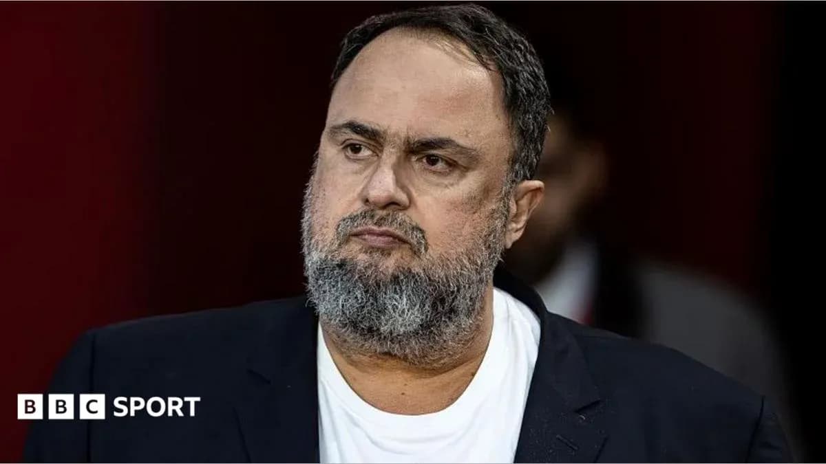 Man in a suit with a beard looking serious Man in a suit with a beard looking serious