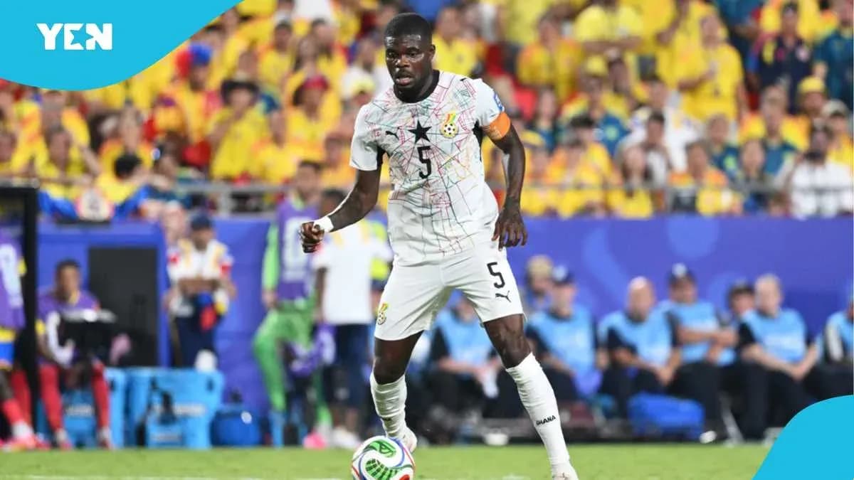 Ghana player dribbling the ball during match Ghana player dribbling the ball during match
