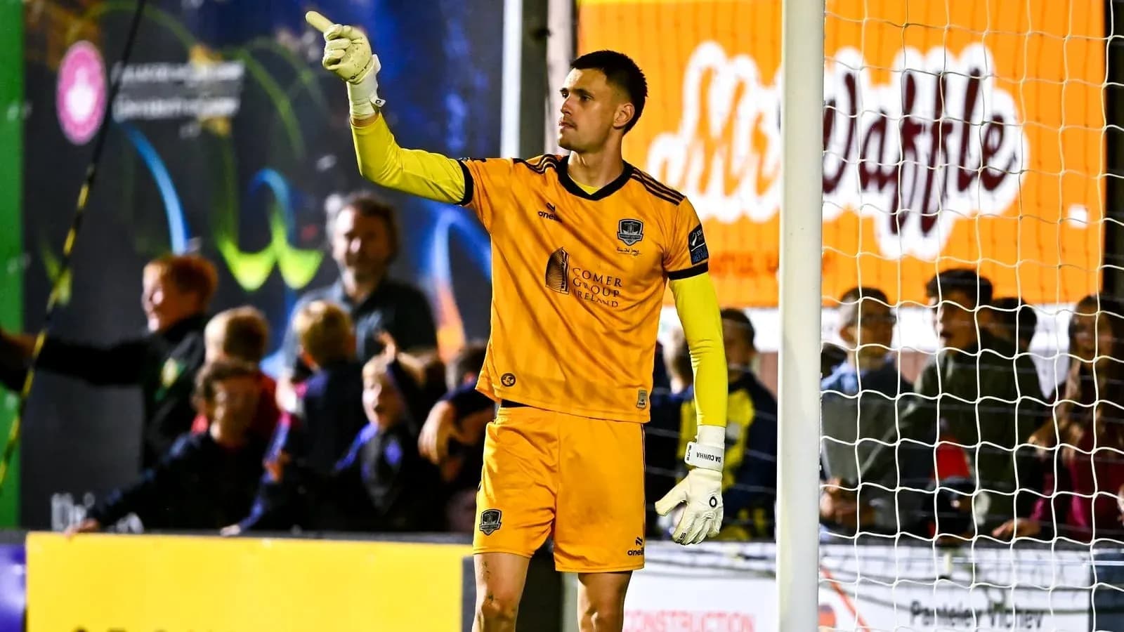 Goalkeeper gesturing during a soccer match Goalkeeper gesturing during a soccer match