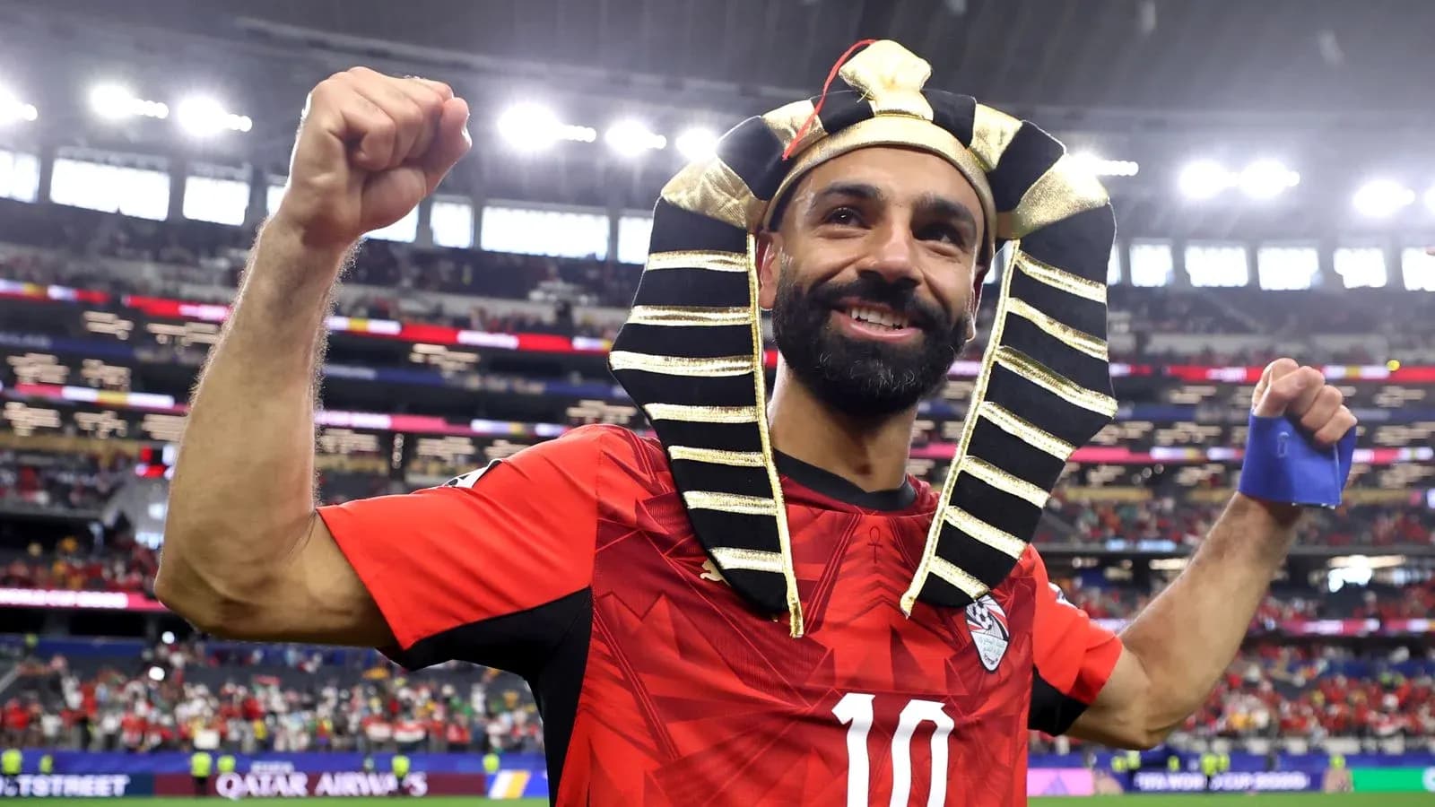 Player celebrating in Egyptian pharaoh headdress Player celebrating in Egyptian pharaoh headdress
