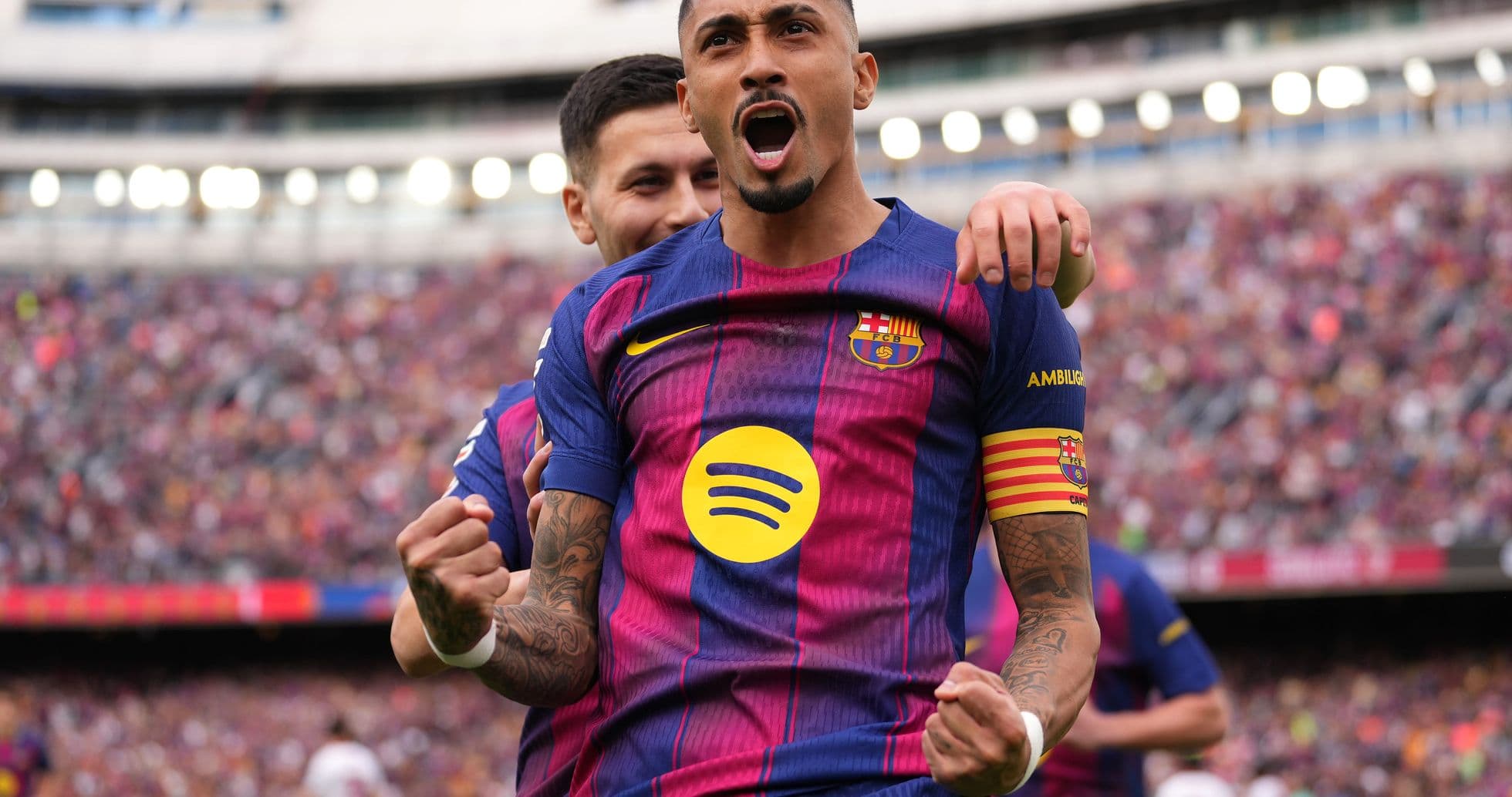 Barcelona player celebrating a goal in La Liga Barcelona player celebrating a goal in La Liga