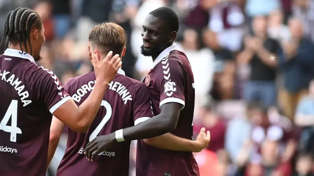 Hearts players celebrating a goal during match Hearts players celebrating a goal during match