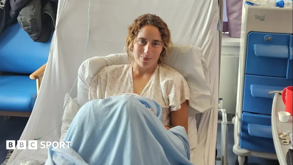 Athlete resting in hospital bed with blanket Athlete resting in hospital bed with blanket