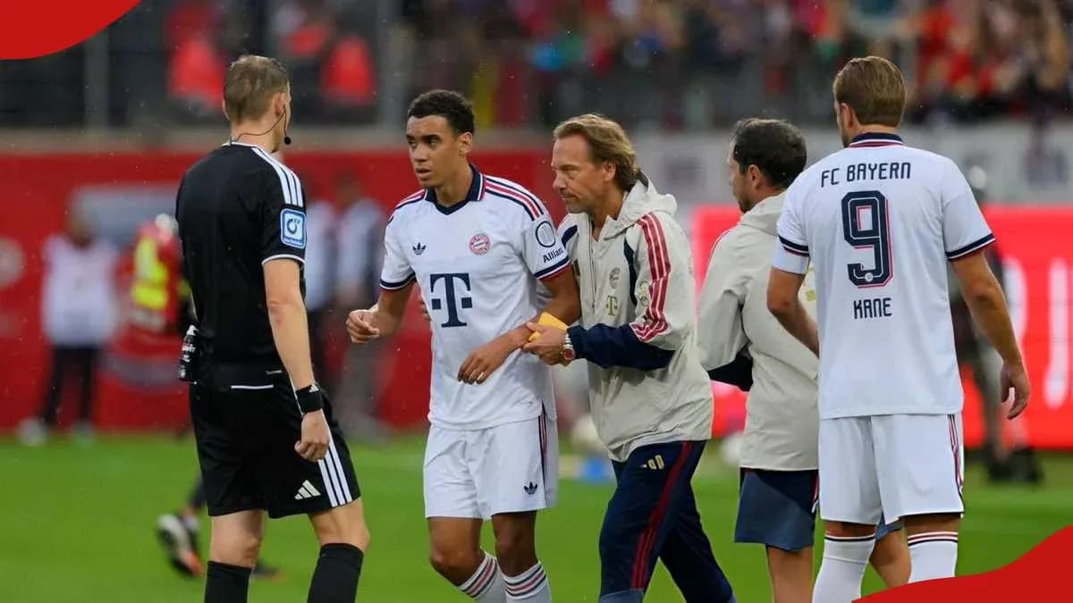 Bayern Munich player being substituted during match Bayern Munich player being substituted during match