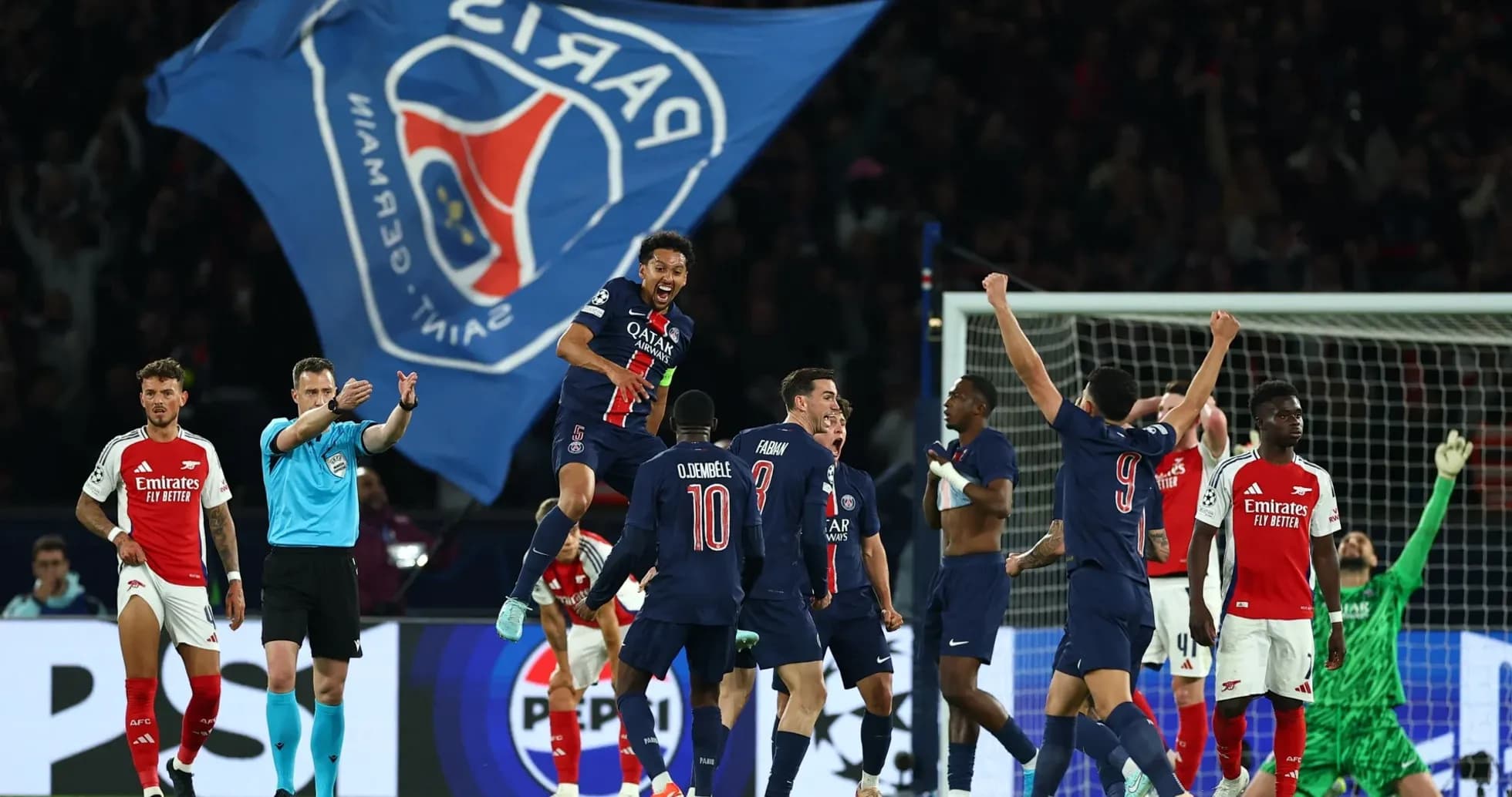 PSG players celebrating victory over Arsenal PSG players celebrating victory over Arsenal
