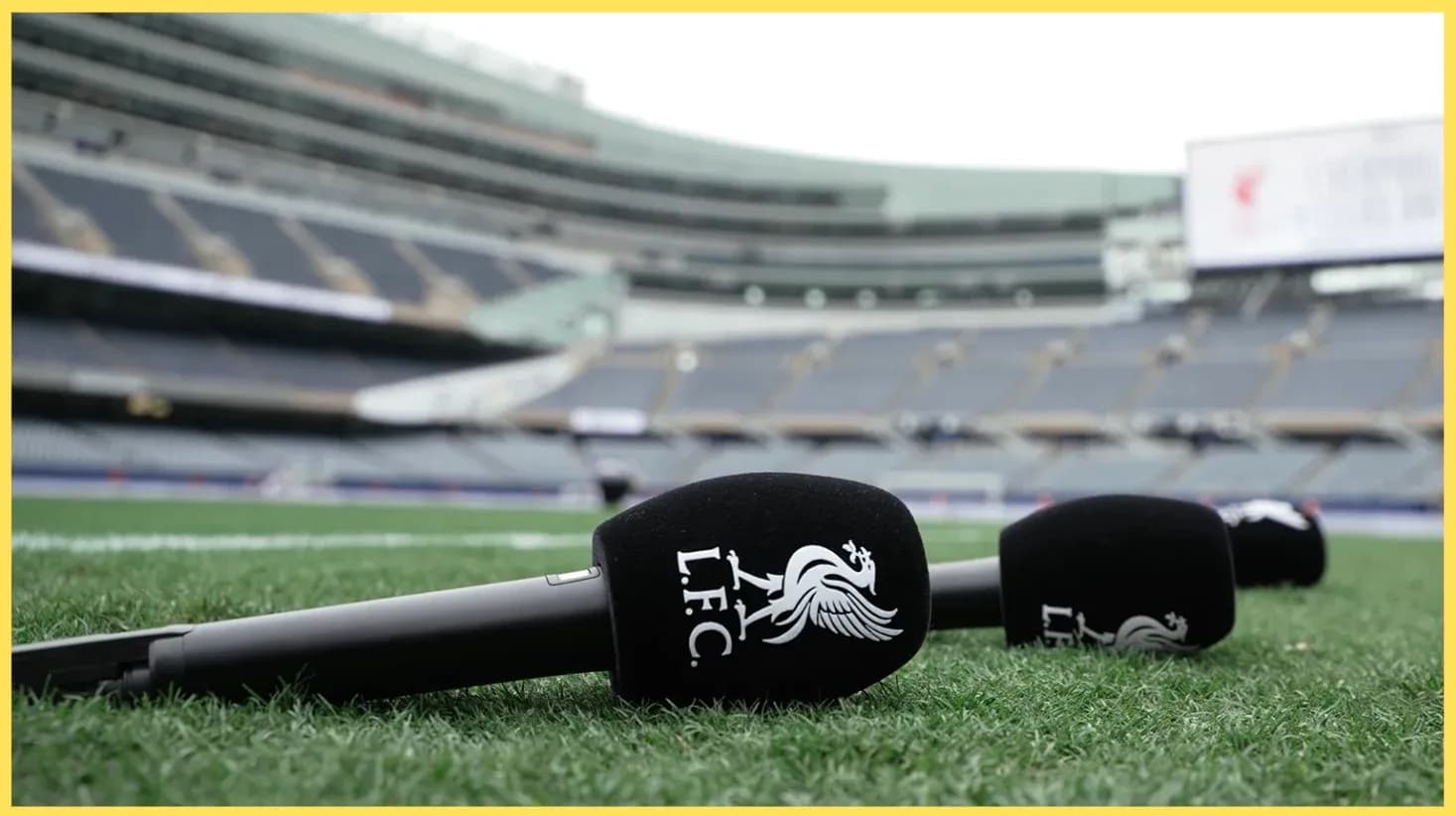Microphones on the pitch at stadium before event Microphones on the pitch at stadium before event