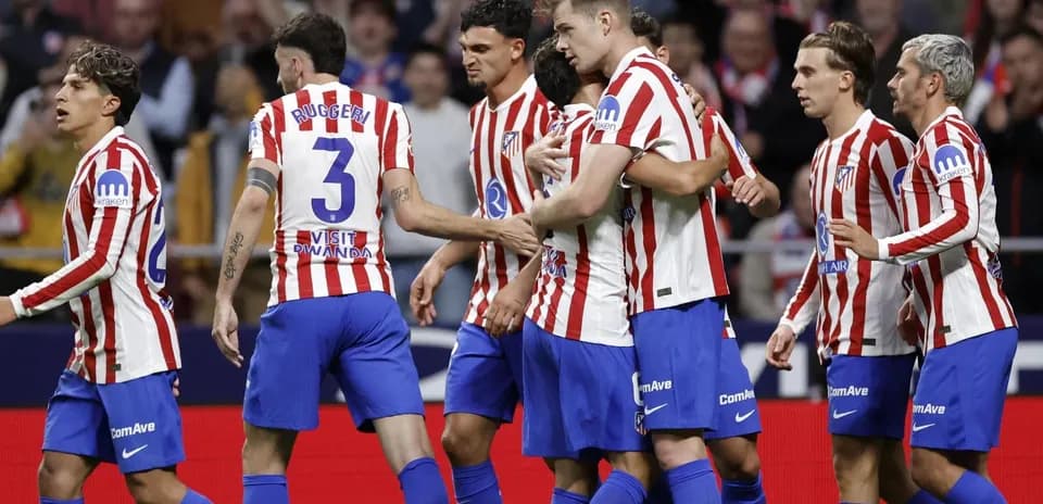 Atletico Madrid players celebrating a goal Atletico Madrid players celebrating a goal
