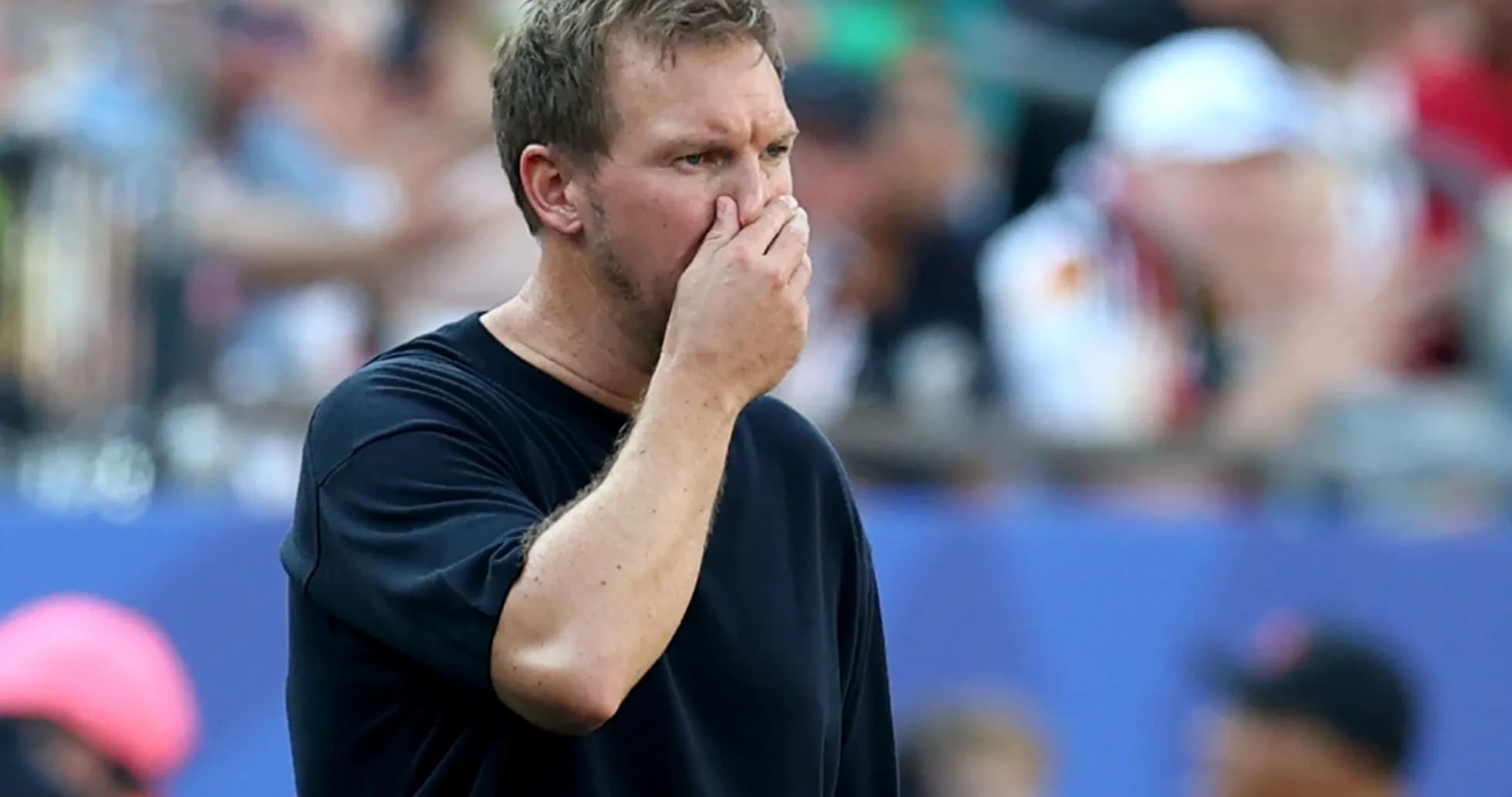Coach looking concerned during a match Coach looking concerned during a match