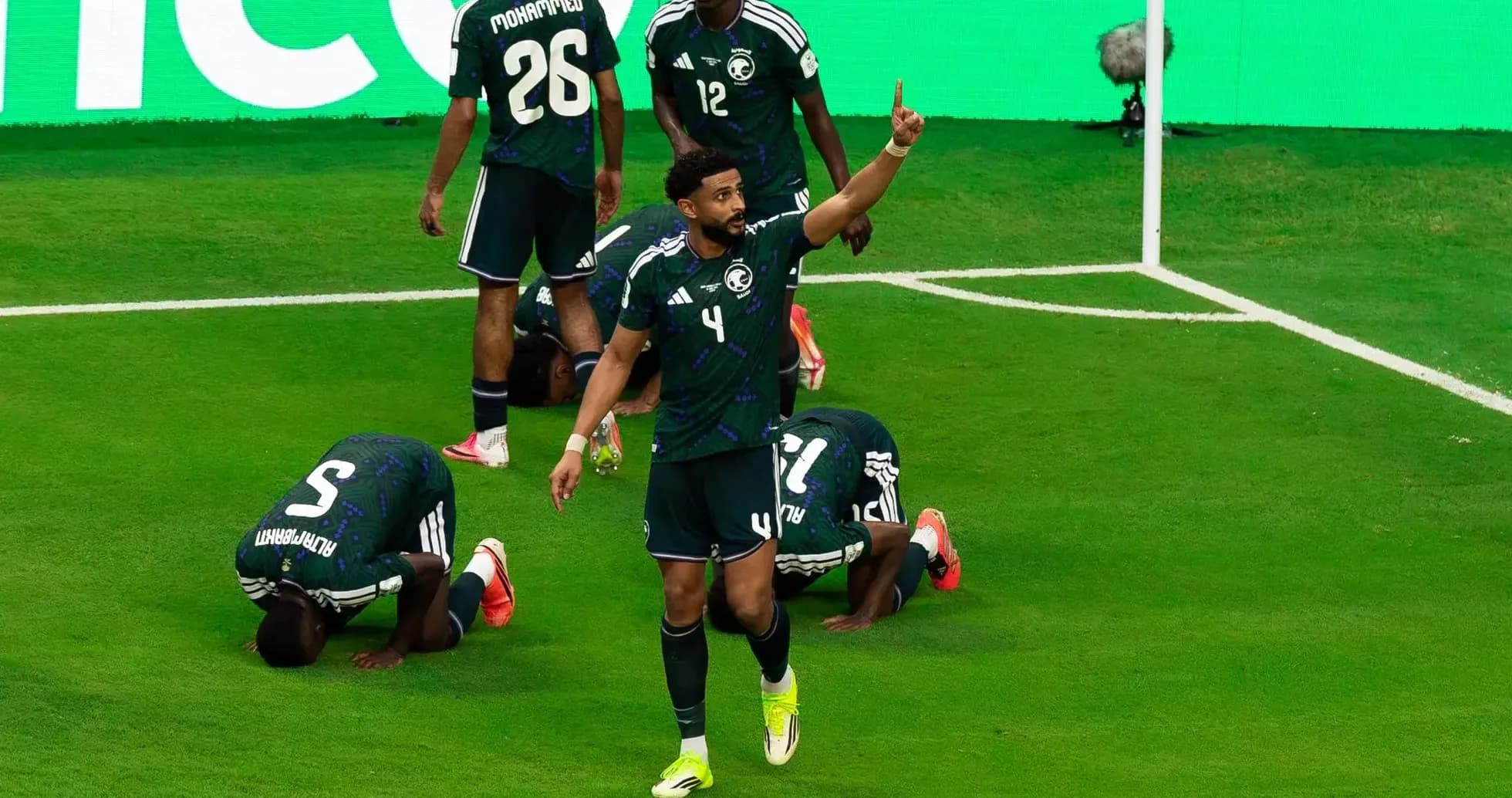 Saudi Arabia players celebrating during World Cup match Saudi Arabia players celebrating during World Cup match