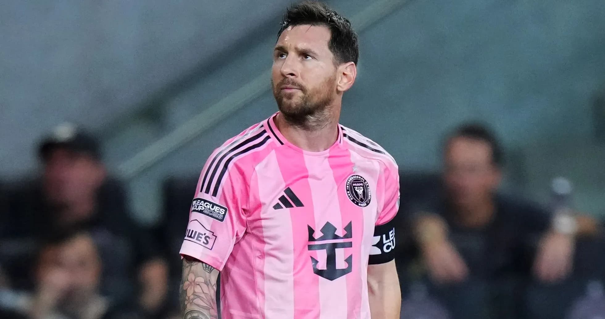 Player wearing pink jersey during a match Player wearing pink jersey during a match