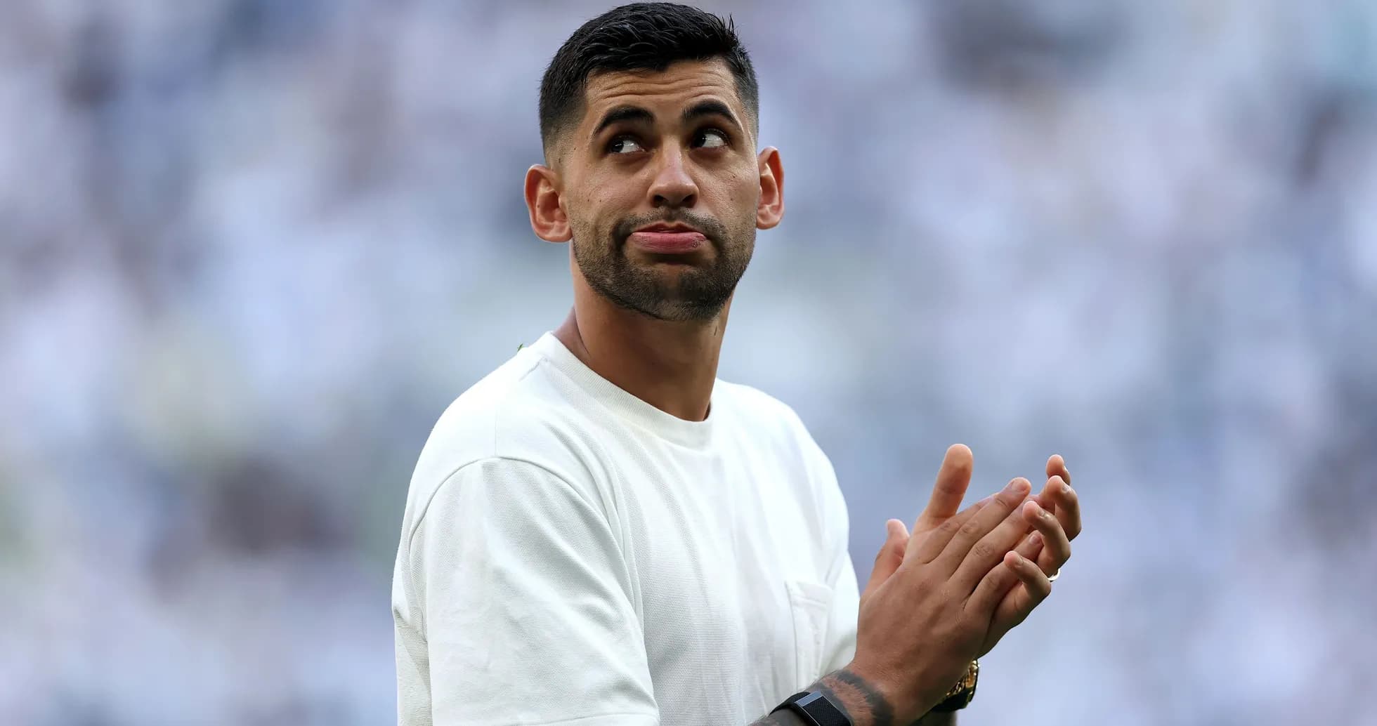 Player applauding during a match warm-up Player applauding during a match warm-up