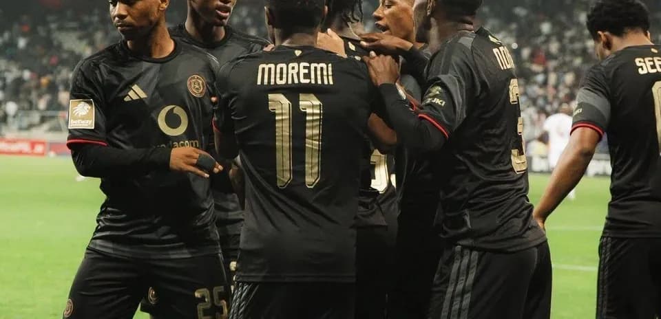 Orlando Pirates players celebrating a goal Orlando Pirates players celebrating a goal