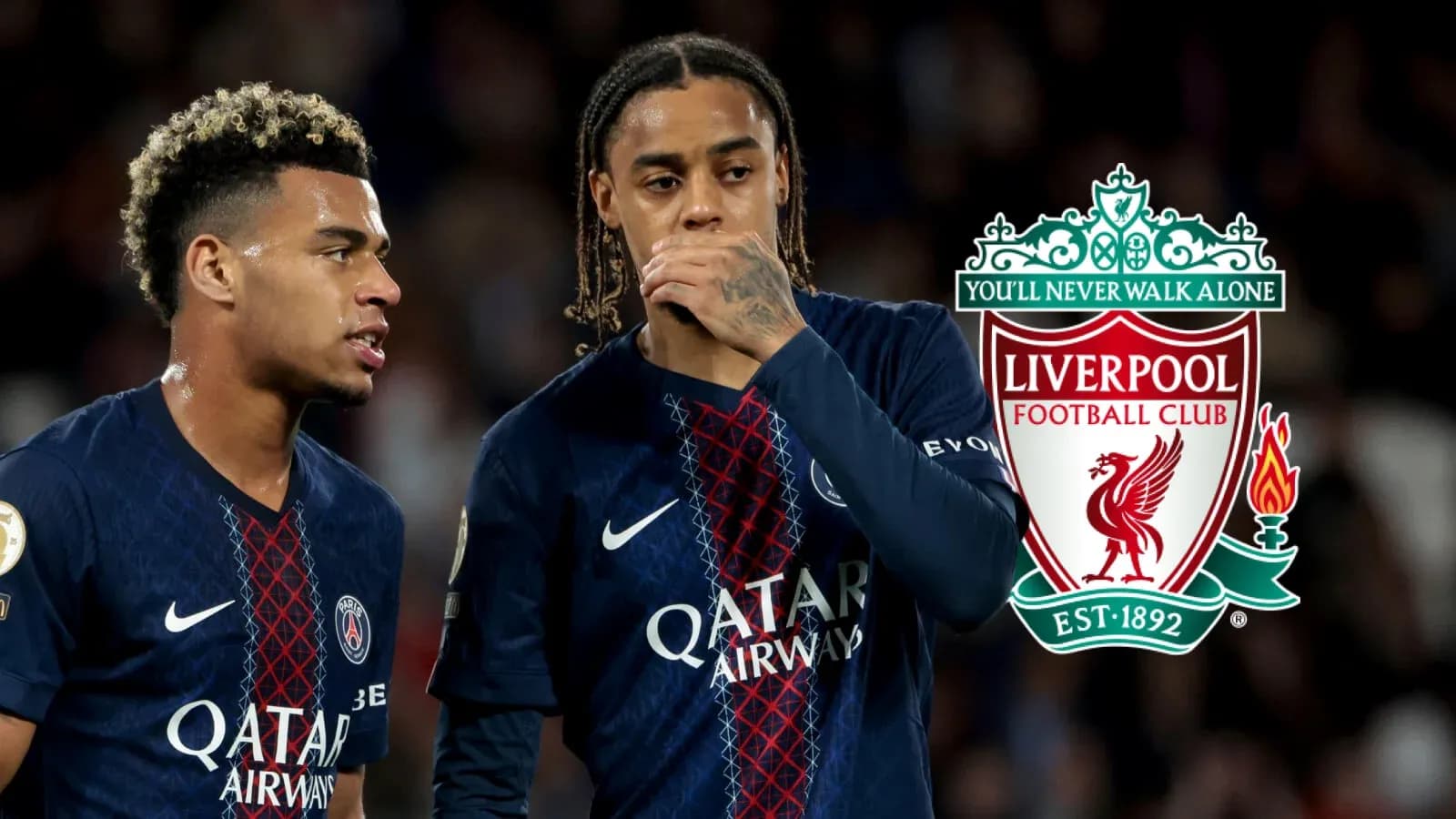 Two players in PSG jerseys during match Two players in PSG jerseys during match