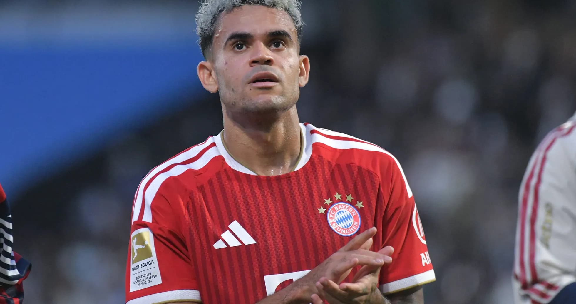 Bayern Munich player clapping on the field Bayern Munich player clapping on the field