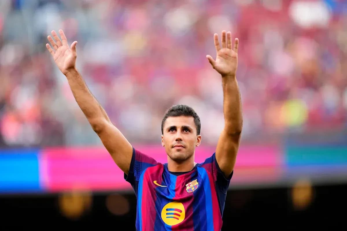 Player waving to fans at stadium during match Player waving to fans at stadium during match