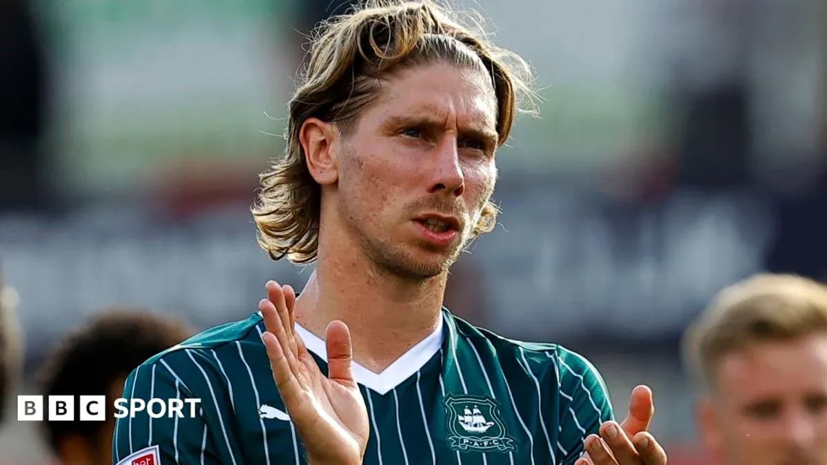 Player applauding fans after a match Player applauding fans after a match