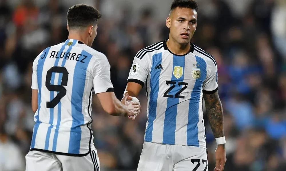 Two Argentine players shaking hands during match Two Argentine players shaking hands during match