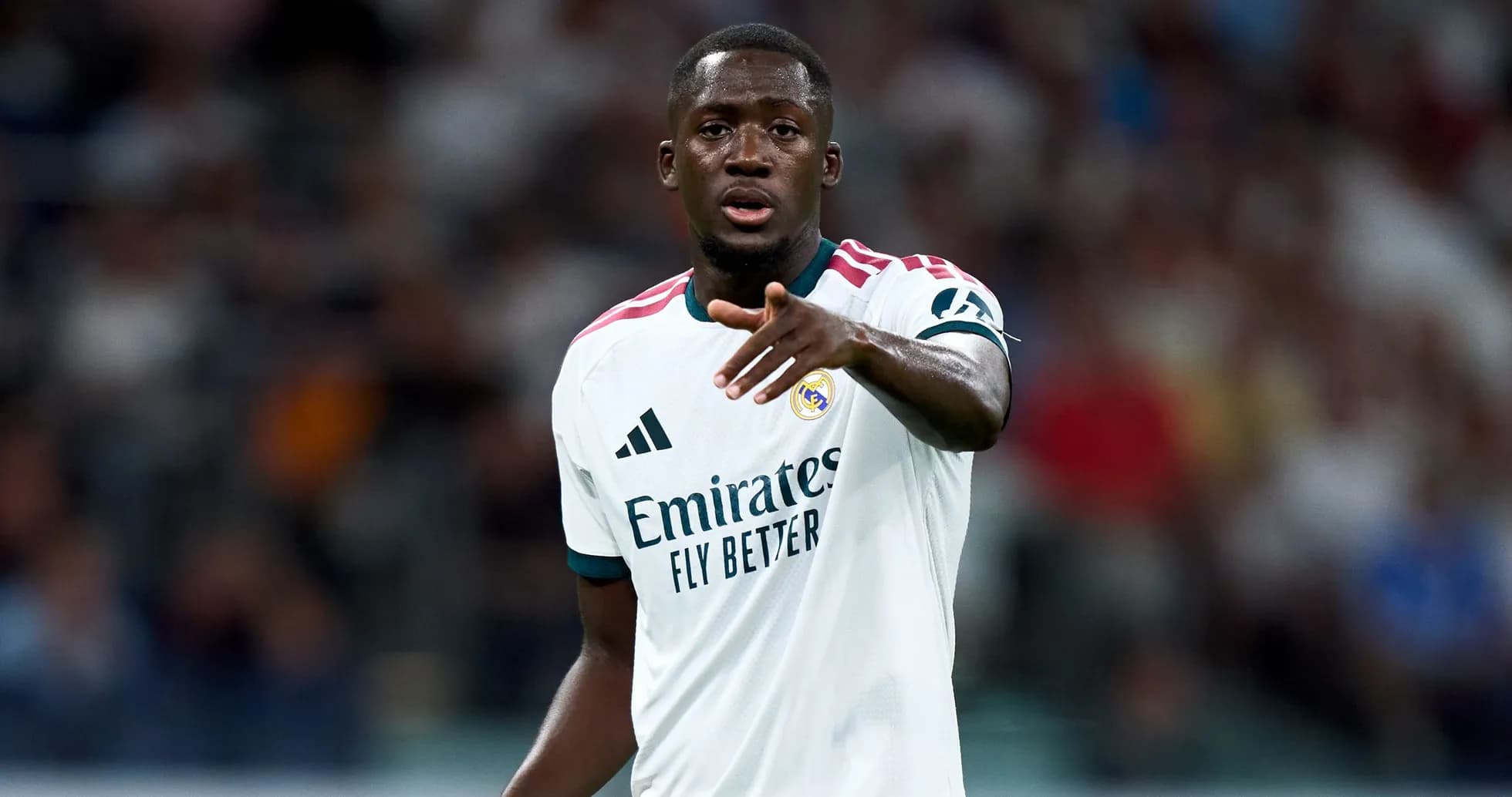 Player gesturing during a match wearing Real Madrid kit Player gesturing during a match wearing Real Madrid kit