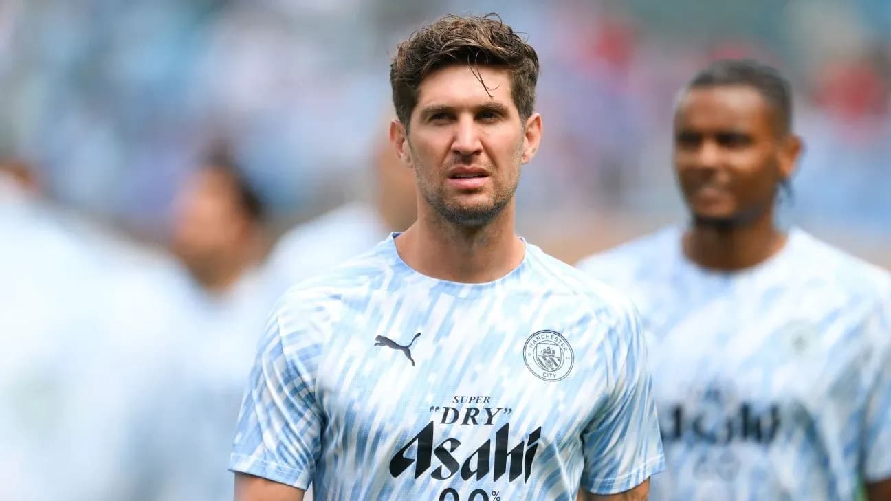 Player wearing Manchester City training kit on pitch Player wearing Manchester City training kit on pitch