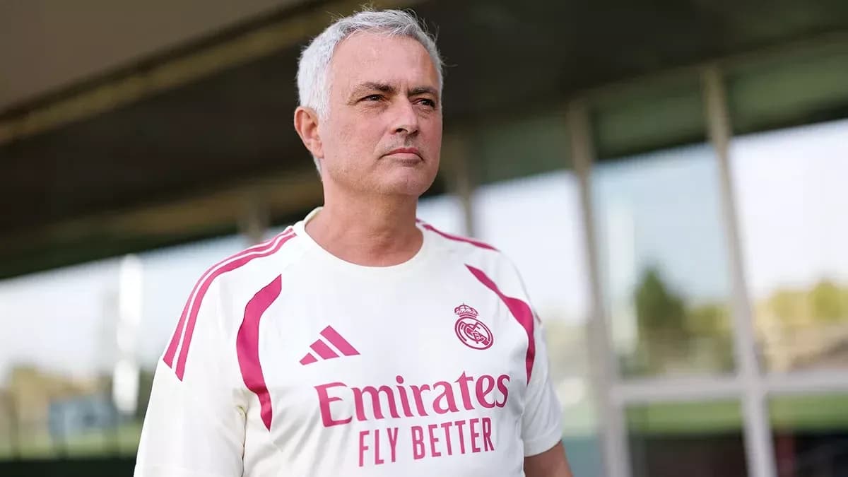 Coach wearing Real Madrid training kit outdoors Coach wearing Real Madrid training kit outdoors