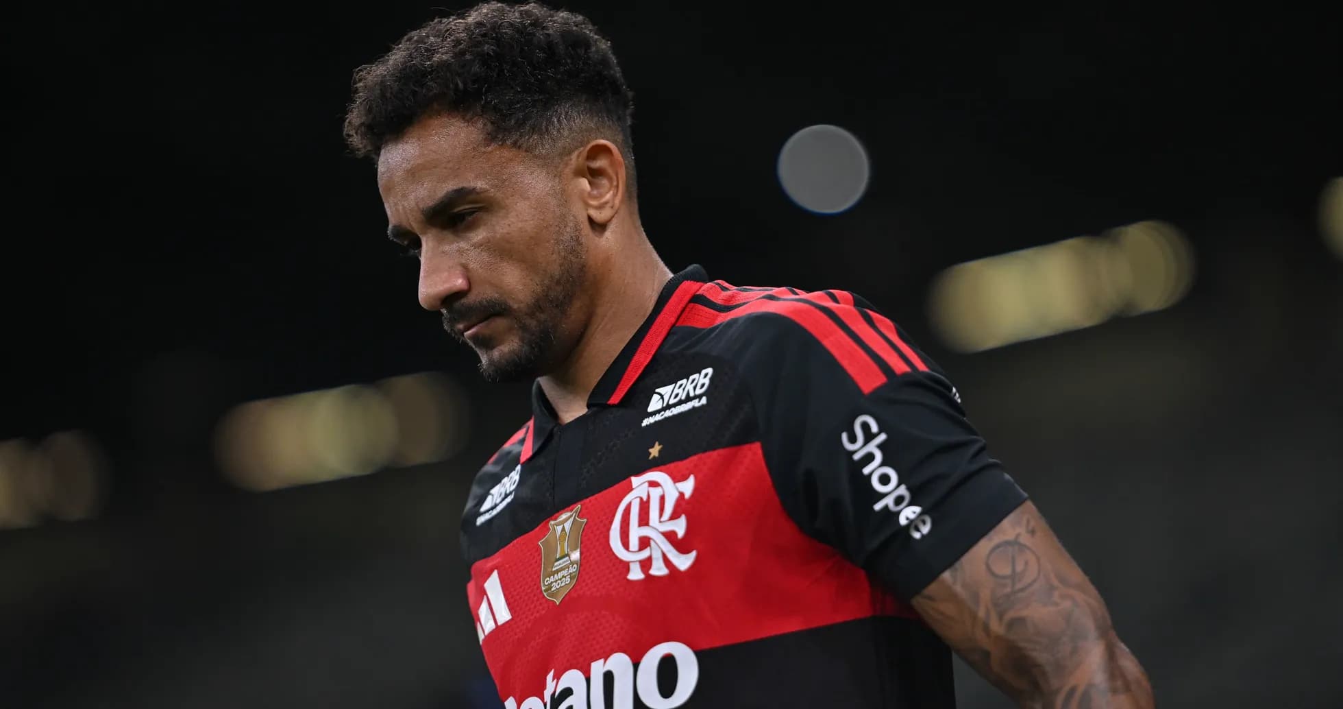 Player in Flamengo jersey walking off the field Player in Flamengo jersey walking off the field