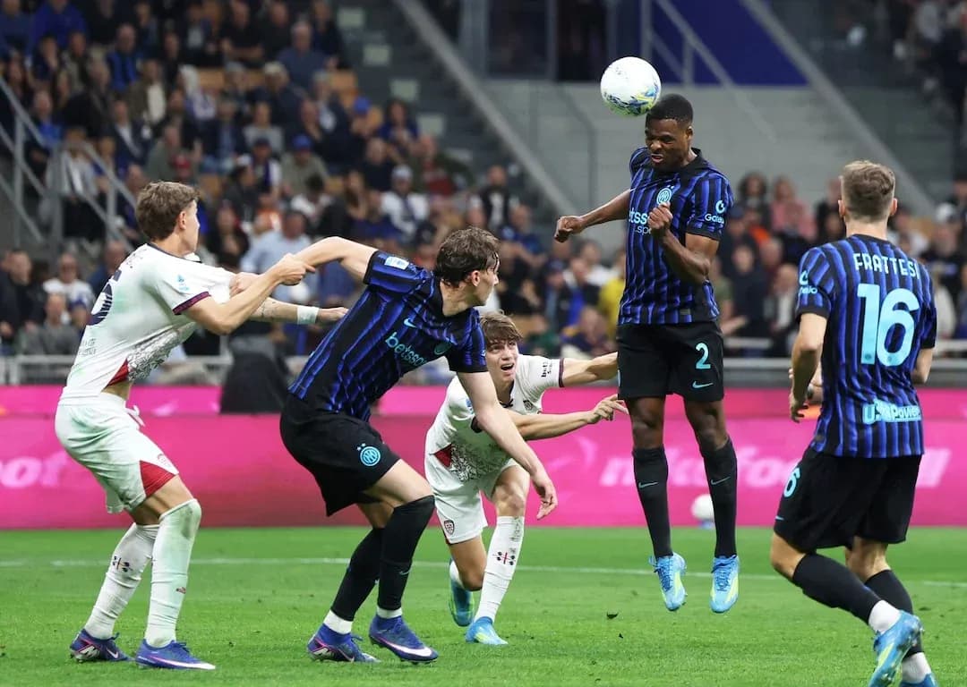 Inter players contesting a header during match Inter players contesting a header during match