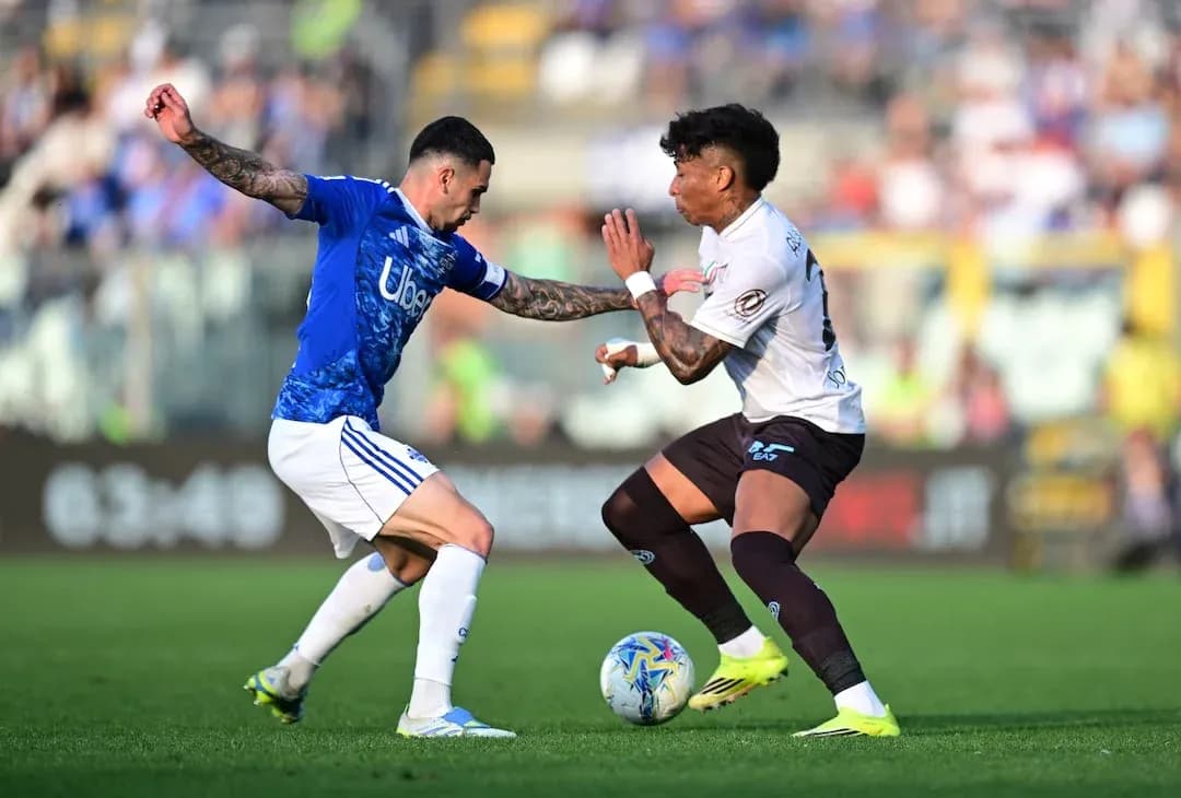 Two players challenging for the ball during match Two players challenging for the ball during match