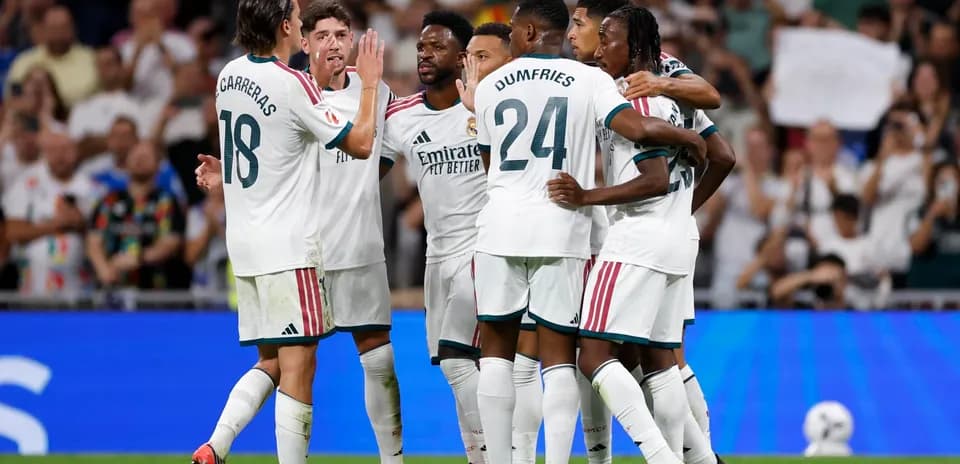 Real Madrid players celebrating a goal Real Madrid players celebrating a goal