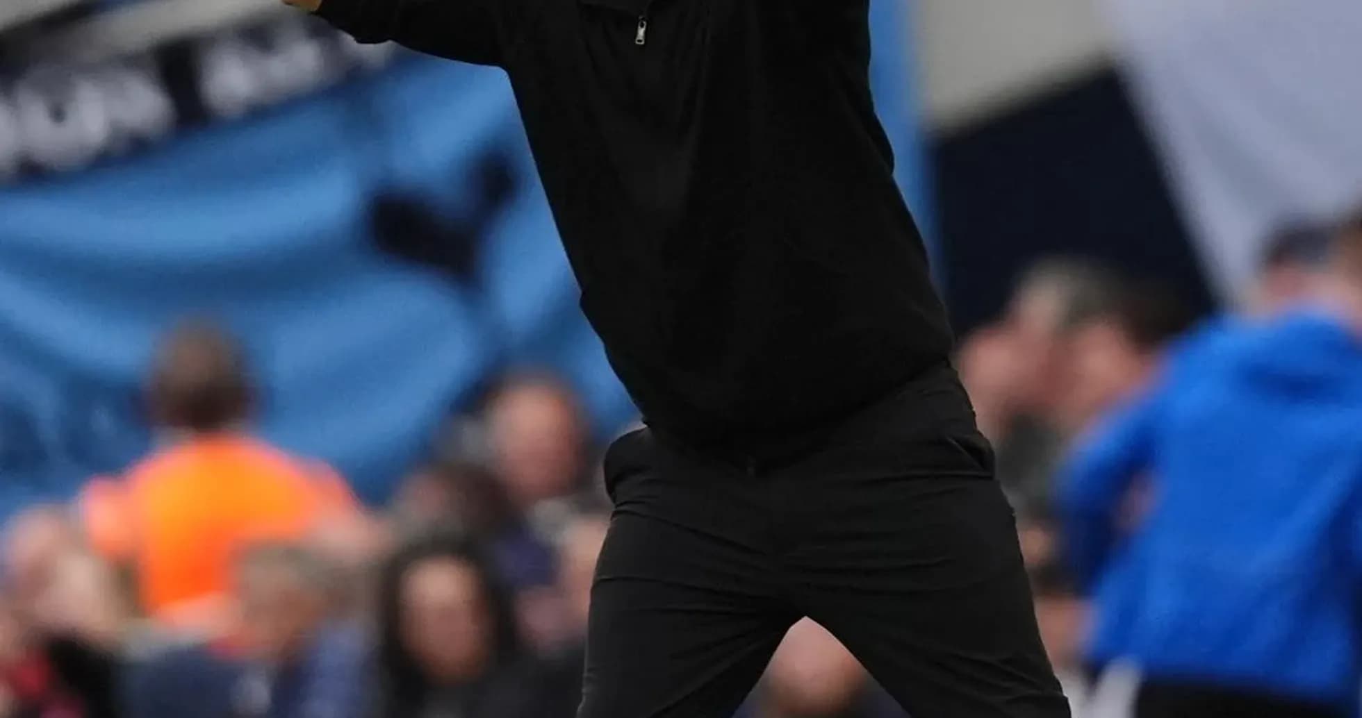 Coach gesturing on the sideline during match Coach gesturing on the sideline during match