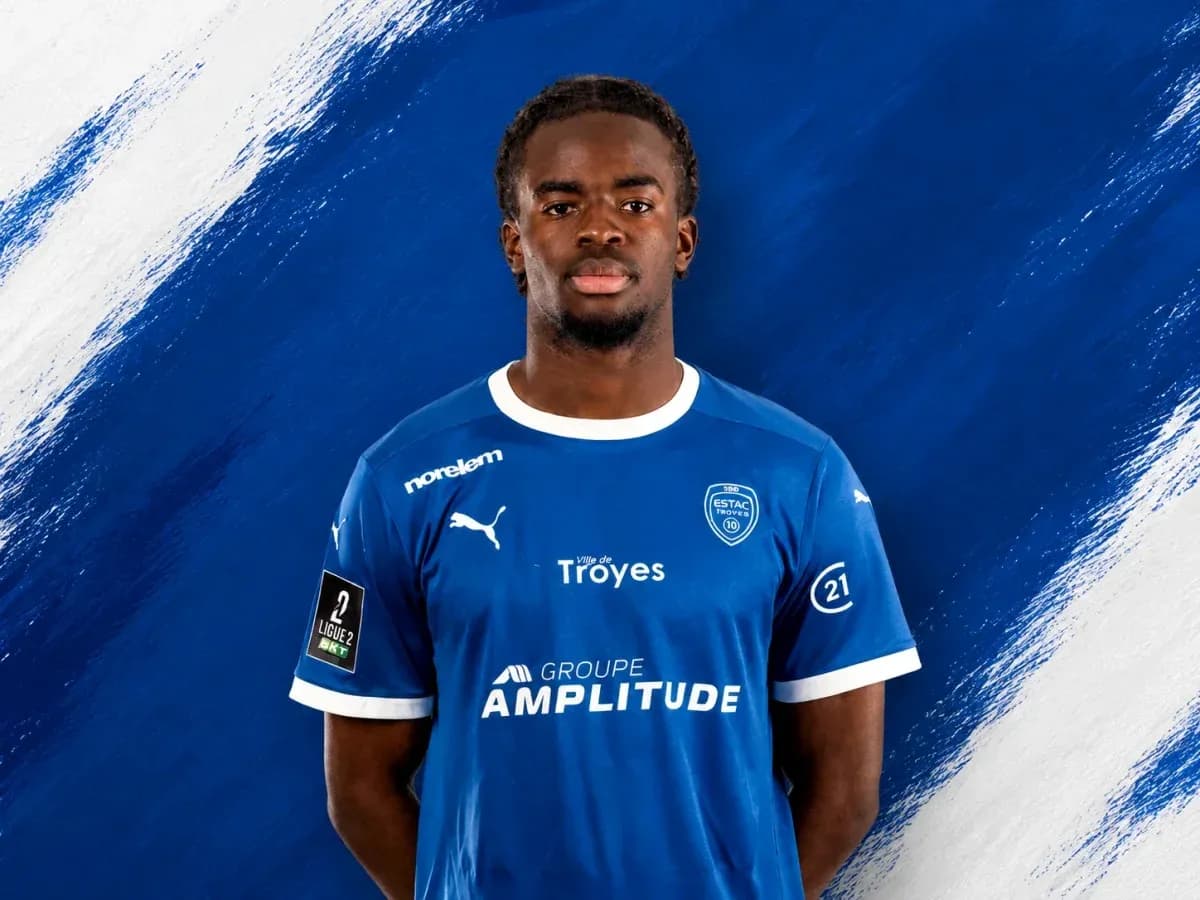 Player posing in blue ESTAC Troyes jersey Player posing in blue ESTAC Troyes jersey