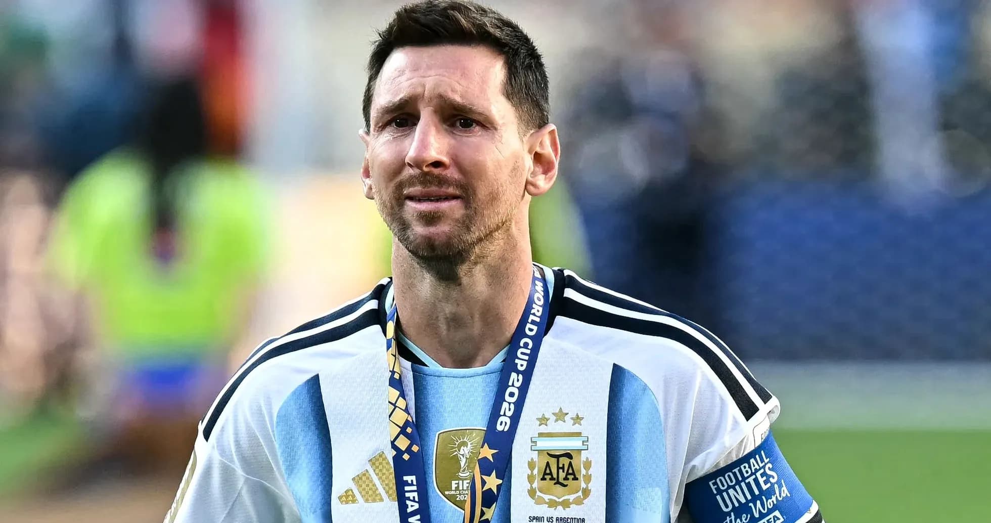 Player wearing Argentina jersey with World Cup medal Player wearing Argentina jersey with World Cup medal