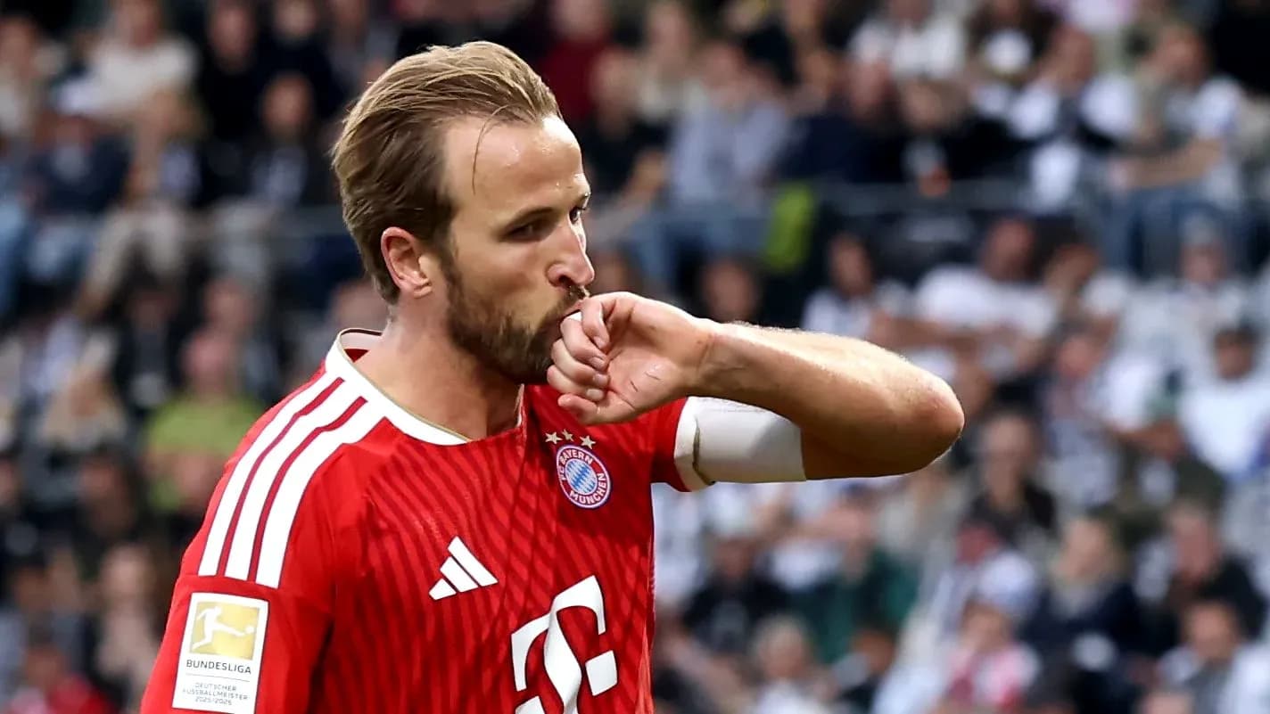 Player celebrating with a kiss on his wrist Player celebrating with a kiss on his wrist