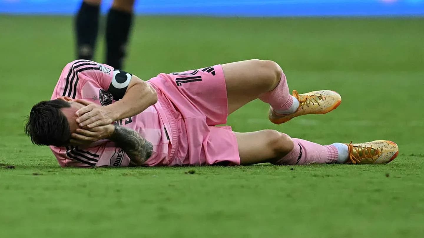 Player lying on the ground in pain during match Player lying on the ground in pain during match