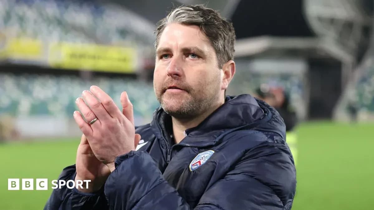 Coach applauding fans after match at stadium Coach applauding fans after match at stadium