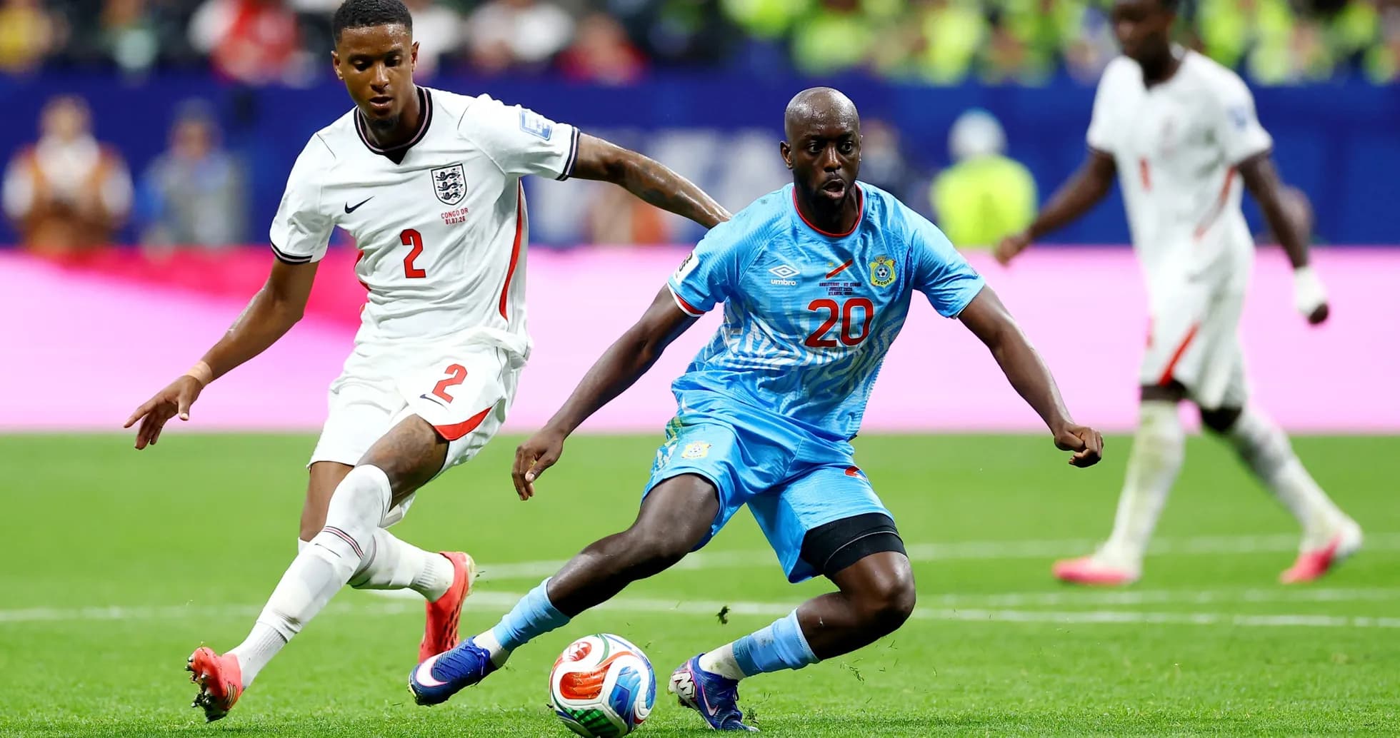 England player challenges Congo DR player for the ball England player challenges Congo DR player for the ball