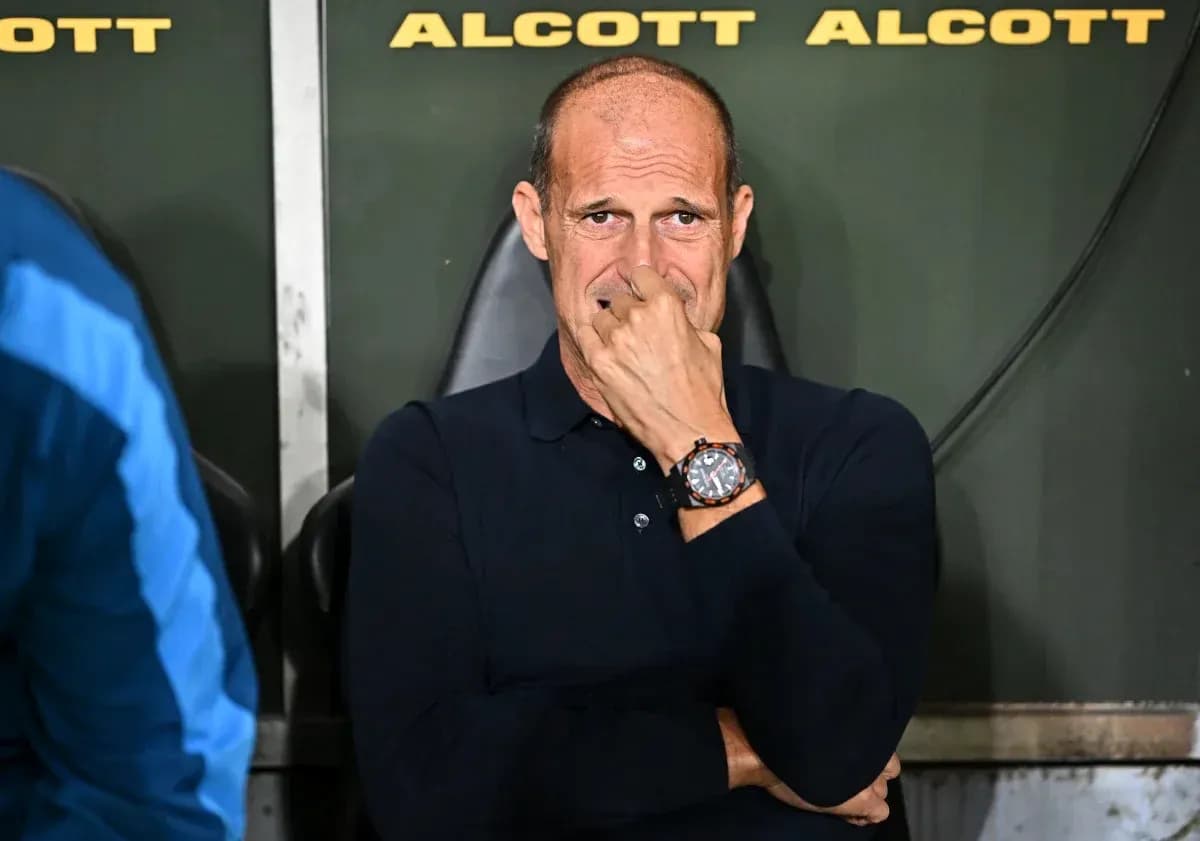 Coach sitting on bench during match Coach sitting on bench during match