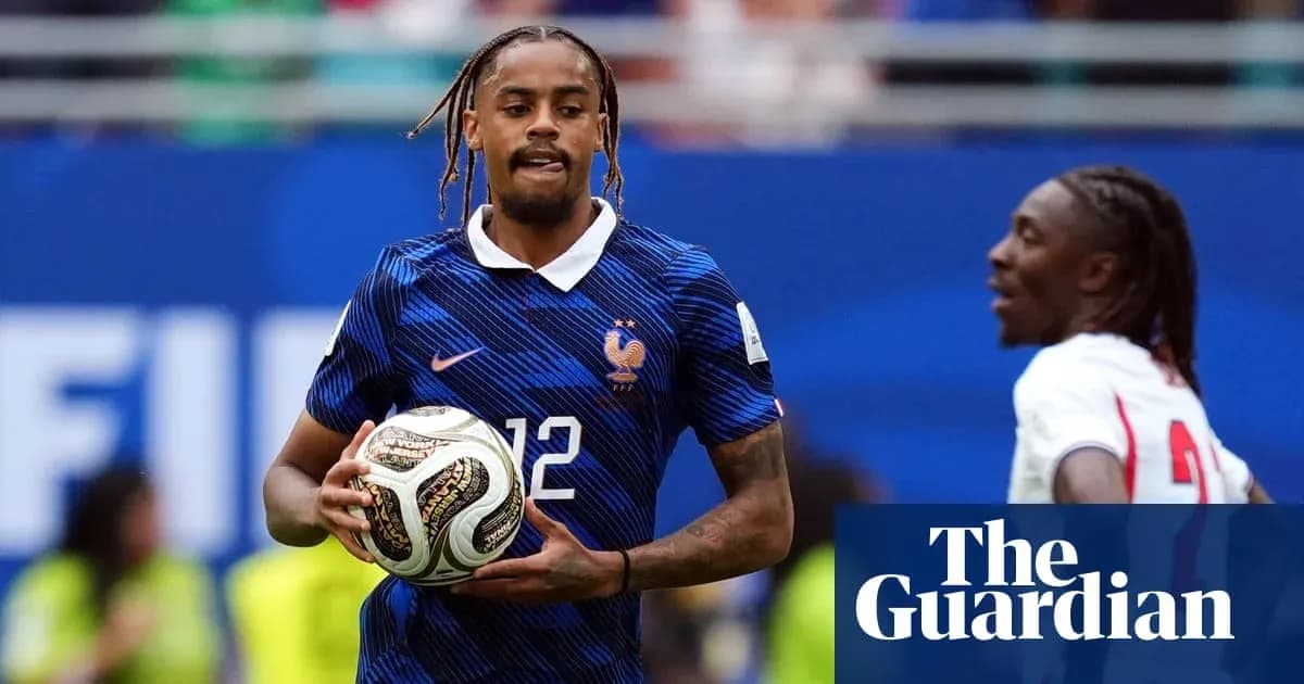Player in blue France kit holding soccer ball Player in blue France kit holding soccer ball