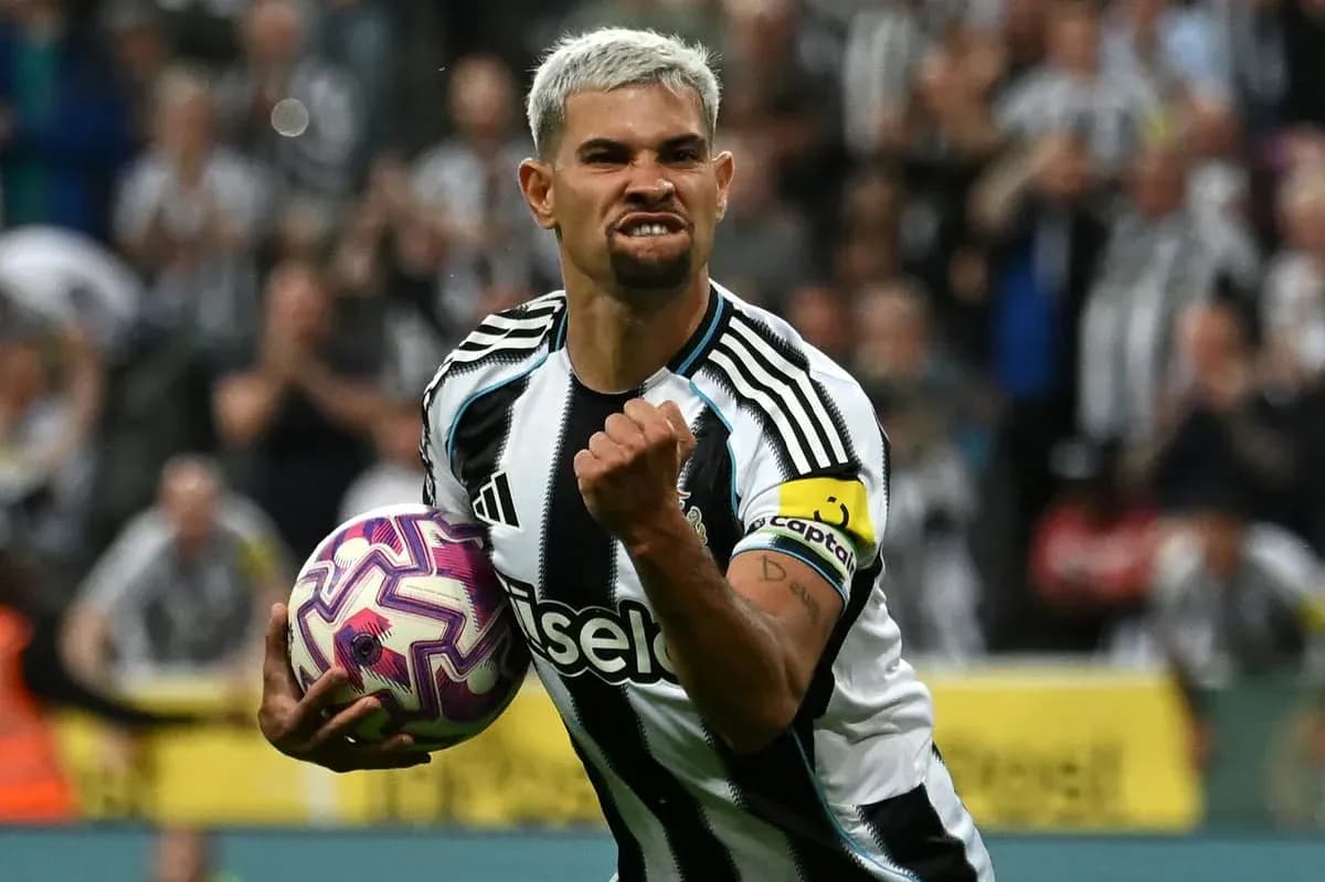 Player celebrating with ball after scoring goal Player celebrating with ball after scoring goal