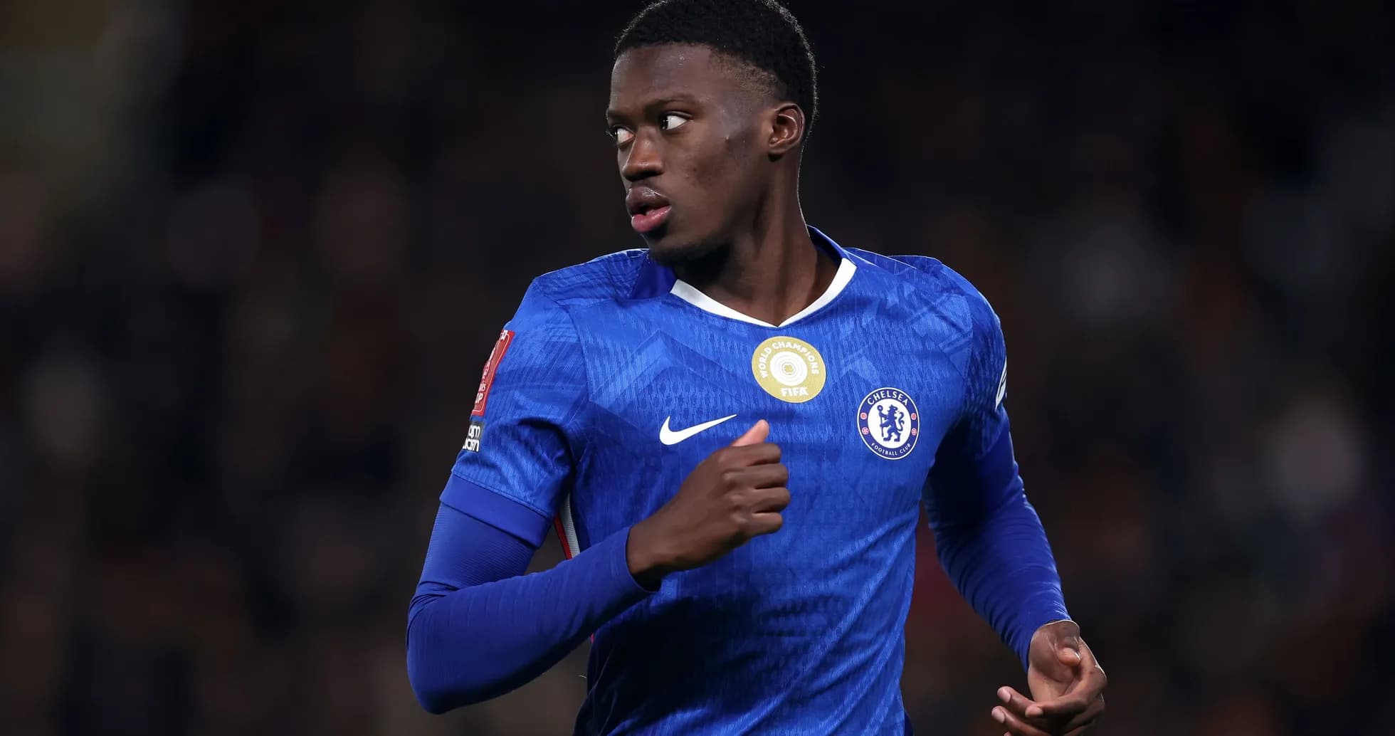 Chelsea player running during a match Chelsea player running during a match