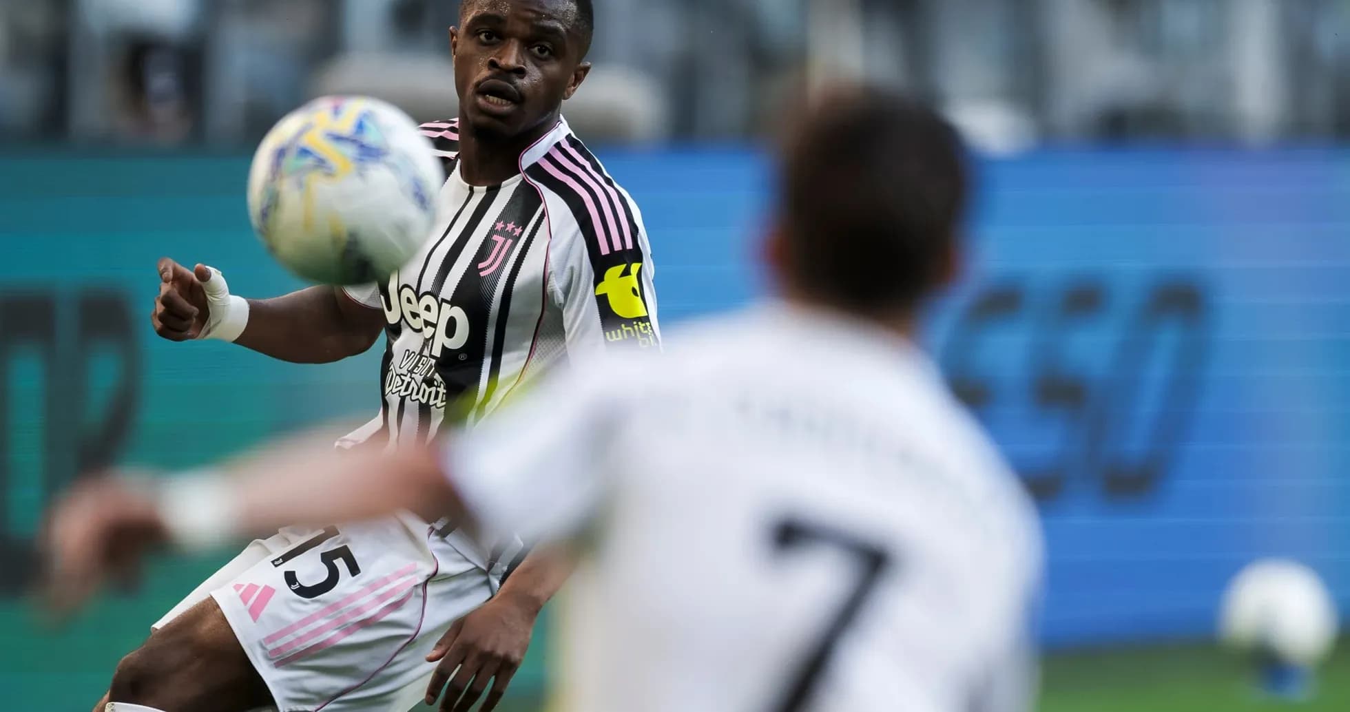 Juventus player receiving the ball during match Juventus player receiving the ball during match