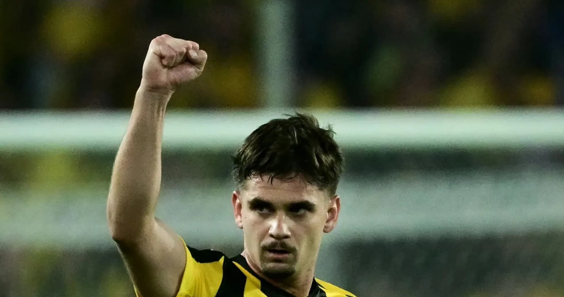 AEK Athens player celebrating after scoring AEK Athens player celebrating after scoring