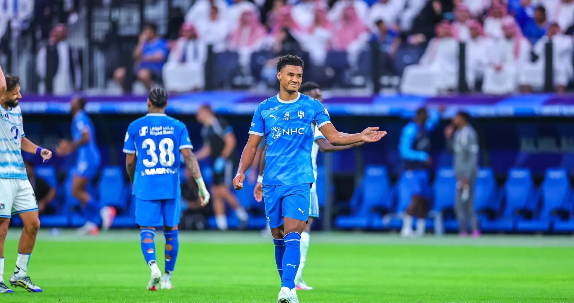 Player gesturing during a football match on field Player gesturing during a football match on field