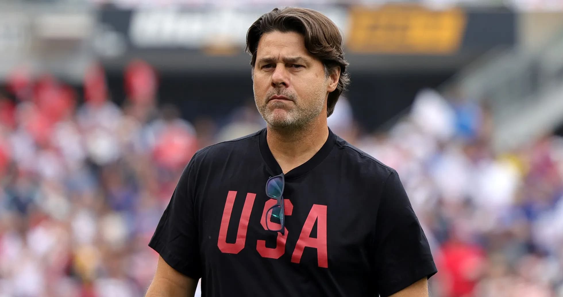 Coach wearing USA shirt on the field Coach wearing USA shirt on the field