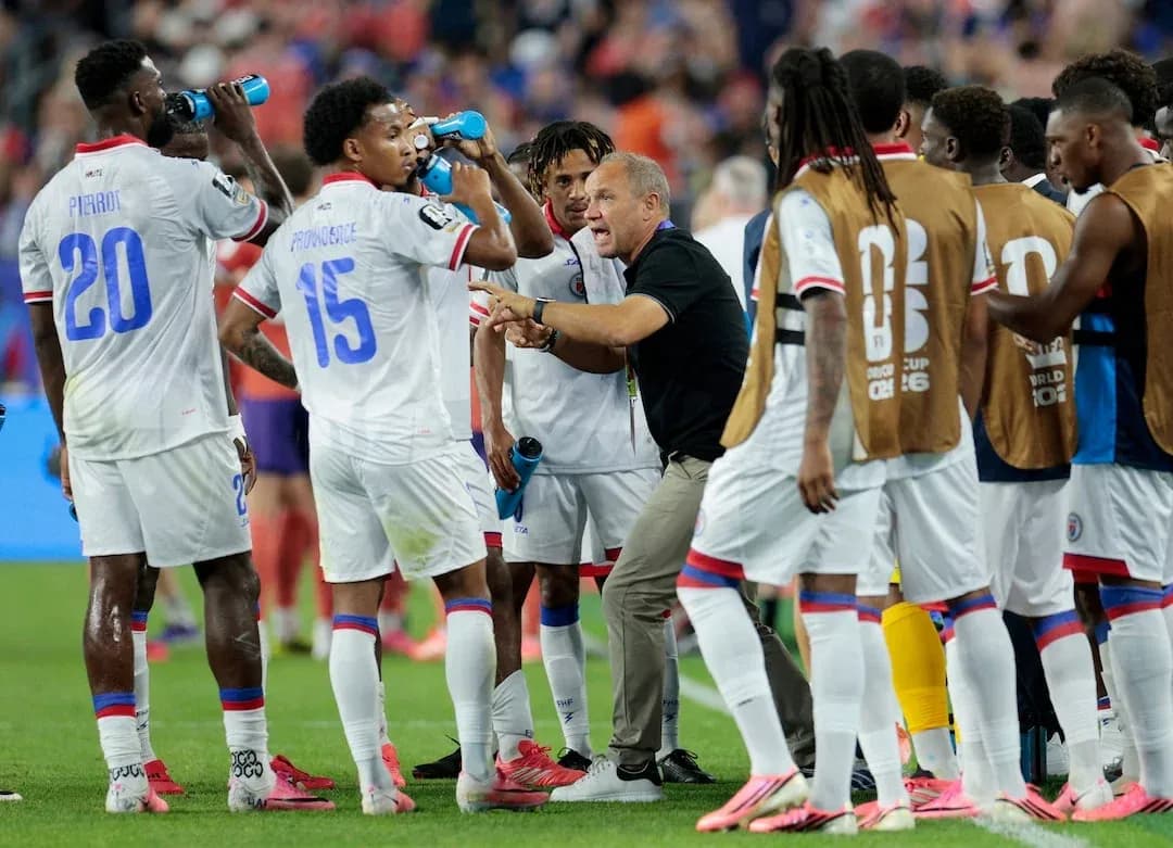 Haiti players drinking water during a match Haiti players drinking water during a match
