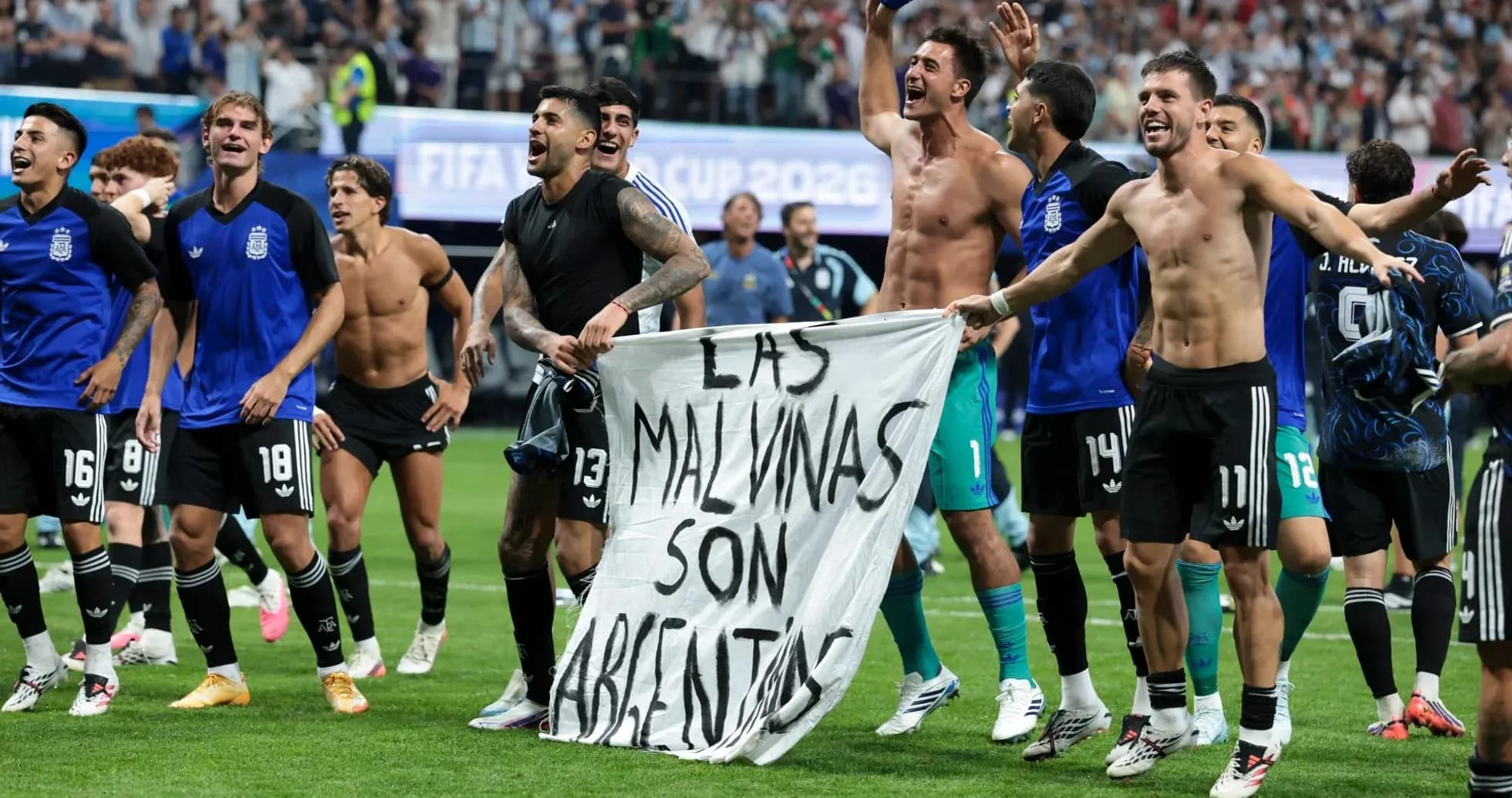 Argentina players celebrating with banner after match Argentina players celebrating with banner after match