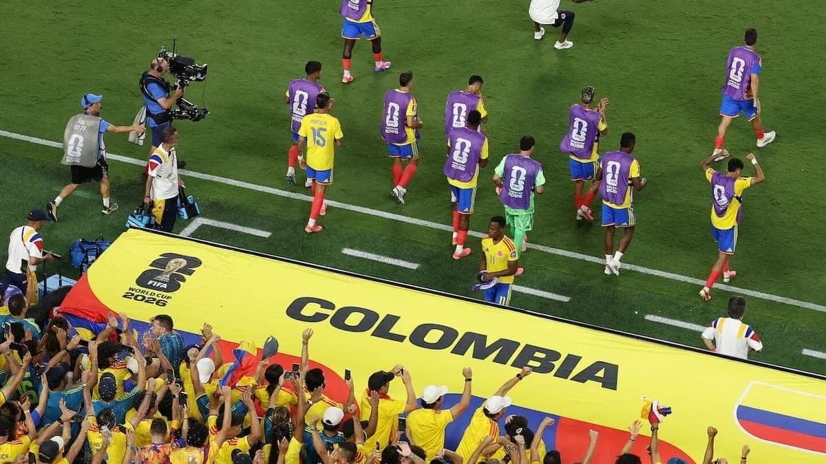 Colombia team celebrating with fans during match Colombia team celebrating with fans during match