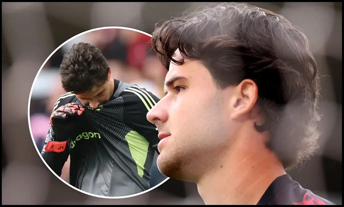 Goalkeeper preparing for match with focused expression Goalkeeper preparing for match with focused expression