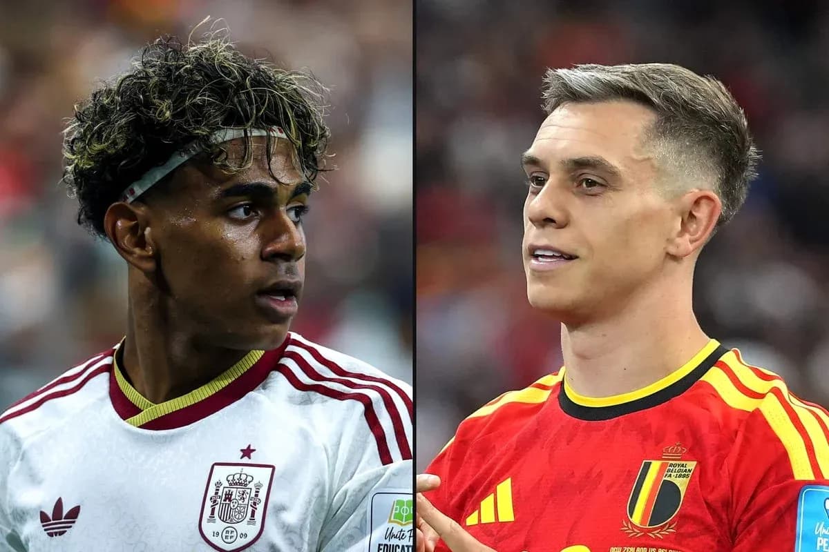 Two soccer players from Spain and Belgium facing each other Two soccer players from Spain and Belgium facing each other
